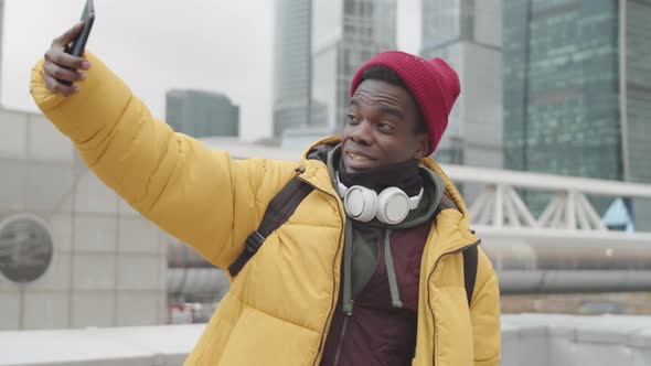 Young African Man Making Selfie Outdoors