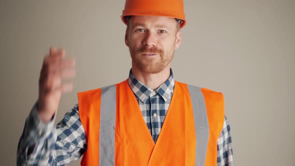 Concentrated builder screaming at the camera