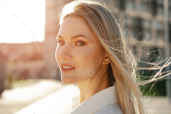 Close up portrait of young businesswoman outdoors / Photodune, Misc