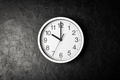 Clock on the black texture background - PhotoDune Item for Sale