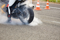 Motorcycle in smoke on the race track - PhotoDune Item for Sale