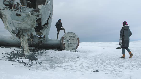 Tourists Walk Next to Slheimasandur Dc 3 Plane Wreck in Iceland