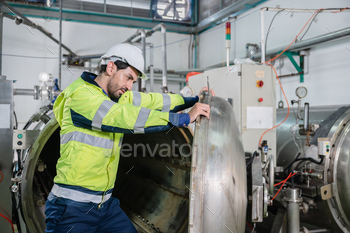 professional technician engineer working to control electrical power and safety service / Photodune, Misc
