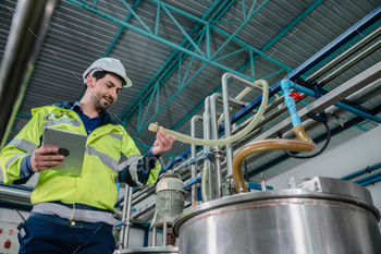 professional technician engineer working to control electrical power and safety service / Photodune, Misc