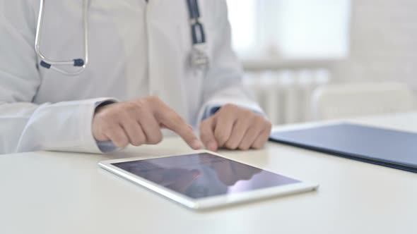 Doctor Using Tablet