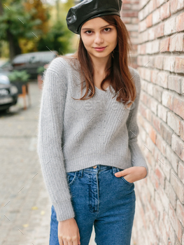 Portrait of attractive girl in the sweatr on the street. Spring or fall day. / Photodune, Misc