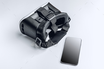 black virtual reality helmet with smart phone isolated on white background / Photodune, Misc