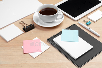 Corporate identity design template on wooden desk close up / Photodune, Misc