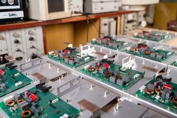 Microcircuits and components lie on metal plates / Photodune, Misc