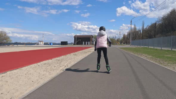 Child is Rollerblading