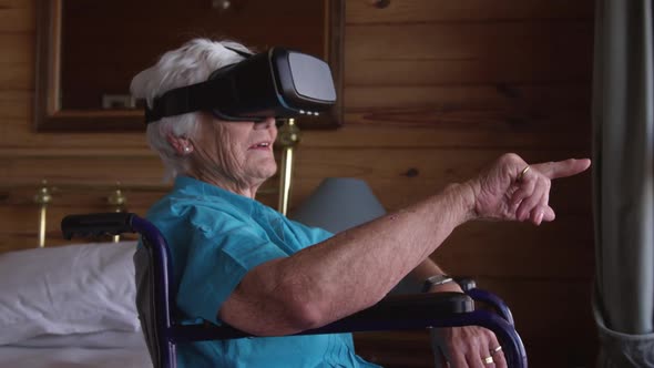 Woman using virtual reality headset at home 4k