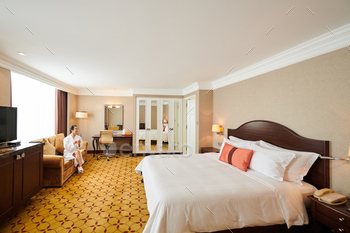 Woman In Large Hotel Room / Photodune, Misc