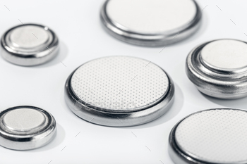 Group of button cell battery on white background / Photodune, Misc