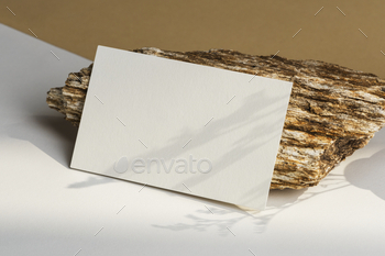 Beige name card and decor stone / Photodune, Misc