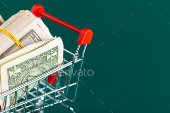 Shopping cart with dollars inside / Photodune, Misc