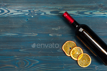Wine bottle on wooden background, close up / Photodune, Misc