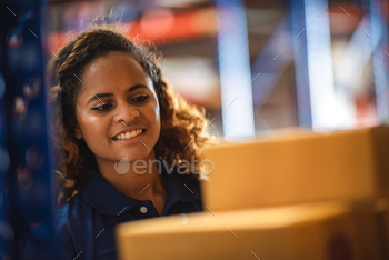 ribution inventory in warehouse factory, female people working in safety occupation job for shipping industry manufacturing