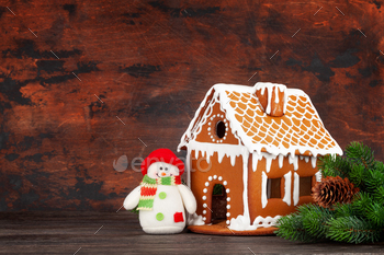 Christmas greeting card with gingerbread house / Photodune, Misc