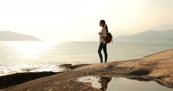 Woman traveling at the seaside