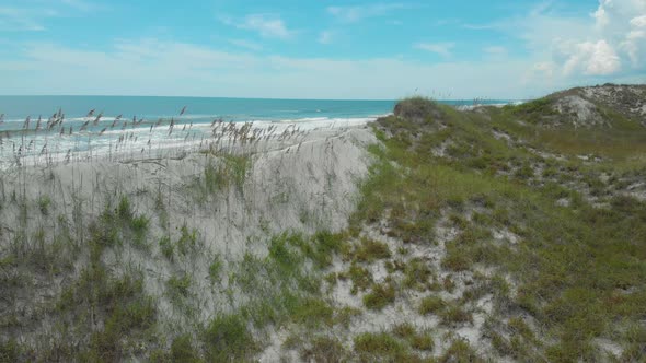 drone shots of the sand dunes and marsh lands at the coast