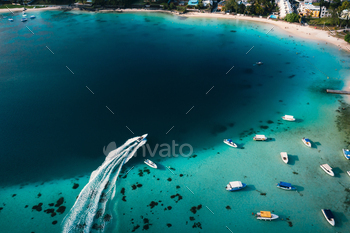 Aerial picture of the east coast of Mauritius Island. Beautiful lagoon of Mauritius Island shot from / Photodune, Misc
