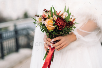 wedding bouquet in the hands of the bride.The decor at the wedding / Photodune, Misc