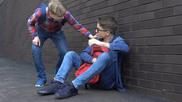 Kind Teenage Boy Starting Friendship With Bullied Student, Helpline for Children