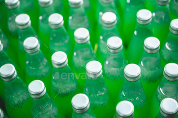 beverage liquid and water drink bottle background, plastic container package / Photodune, Misc
