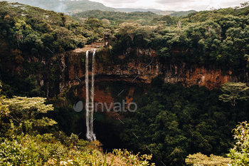 View from the observation deck of the Waterfall in the Chamarel nature Park in Mauritius / Photodune, Misc