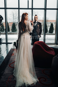 Stylish wedding couple in the interior. Glamorous bride and groom / Photodune, Misc