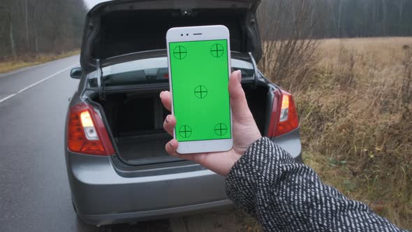 Close Up Hand of Woman Using Vertically Smartphone Green Screen