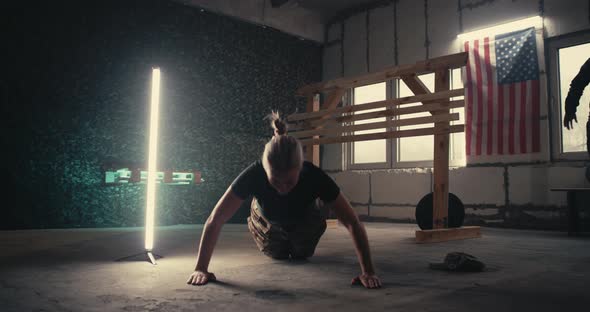 Soldiers Exercising in Grungy Gym