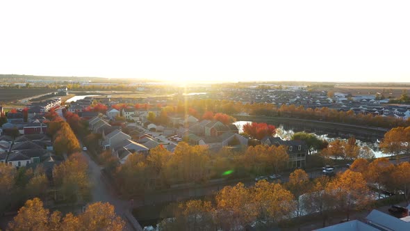 Colorful Fall Neighborhood Sunset Suburbs Lake Drone Shot