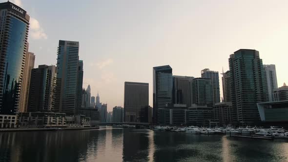 Gorgeous Luxury Yachts Docked in Dubai Marina Surrounded By Massive Skyscrapers