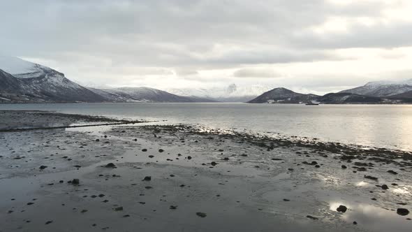 Scenic View From The Coast Of Balsfjorden, A Fjord In Troms og Finnmark, Norway With Overcast. low-l