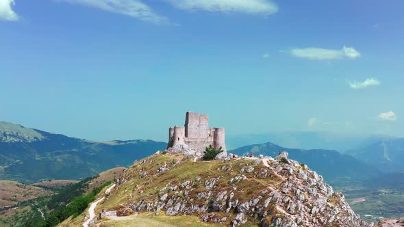 Aerial View of Ancient Castle on Mountain Hill Pine Forest on Mountain Slope