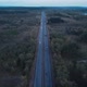 Drone aerial shot of a road passing through rural scene. - VideoHive Item for Sale