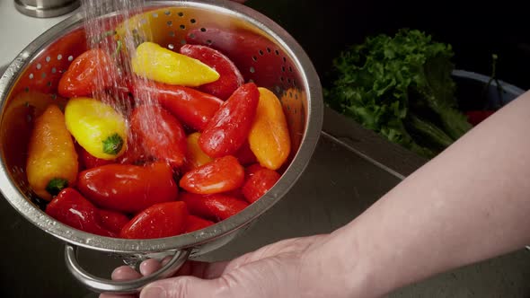 Close Up Of Peppers Being Washed