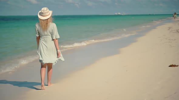 Tanned Woman In Dress. Relaxing On Zanzibar Kiwengwa. Have Great Time On Sea Trip. Holiday Vacation