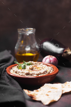 Ezme Eastern indian cuisine in a plate with herbs poured with olive oil with ingredients and lavash / Photodune, Misc