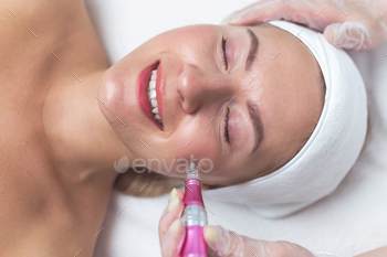 Woman having facial treatment in beauty salon, closeup. Oxy derma therapy / Photodune, Misc