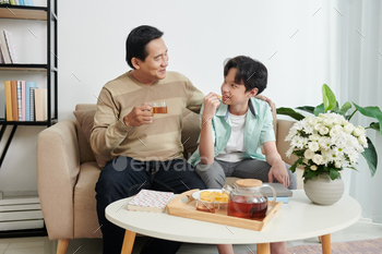 Father and Son Talking / Photodune, Misc