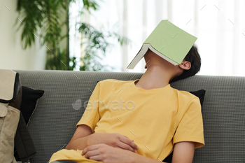 Boy Fell Asleep on Sofa / Photodune, Misc