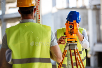 Architect and engineer construction workers working at outdoors construction site / Photodune, Misc