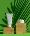 Natural cosmetic wooden presentation podium. Green background with palm shadow - PhotoDune Item for Sale