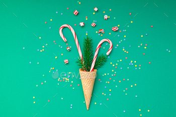 Christmas card with candy canes in waffle cone / Photodune, Misc