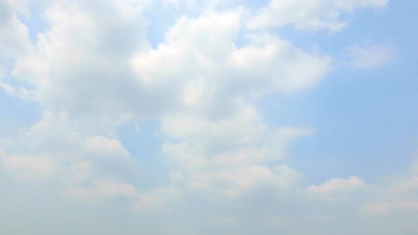 Time lapse of white cloud moving pass around sky background