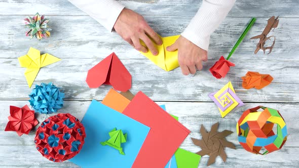 Hands Making Origami Heart, Fast Motion