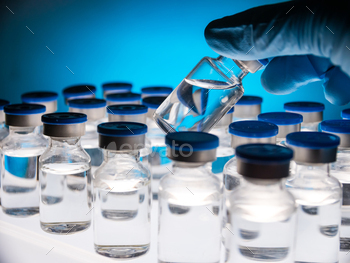 Group of Vaccine bottles. Medicine in ampoules. Glass vials for liquid samples in laboratory. / Photodune, Misc