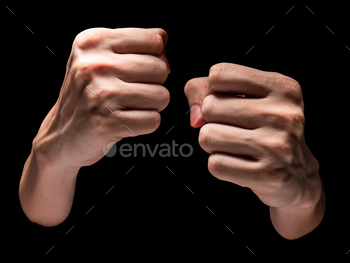 Male hands on a black background. / Photodune, Misc
